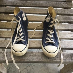 gently worn navy blue high top converse